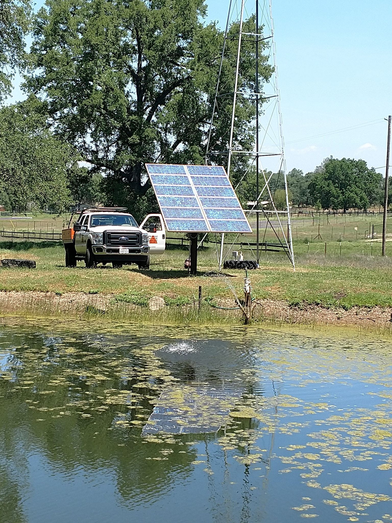 Off-grid System Pump Near a Solar Panel — Rescue, CA — Triangle Well Drilling