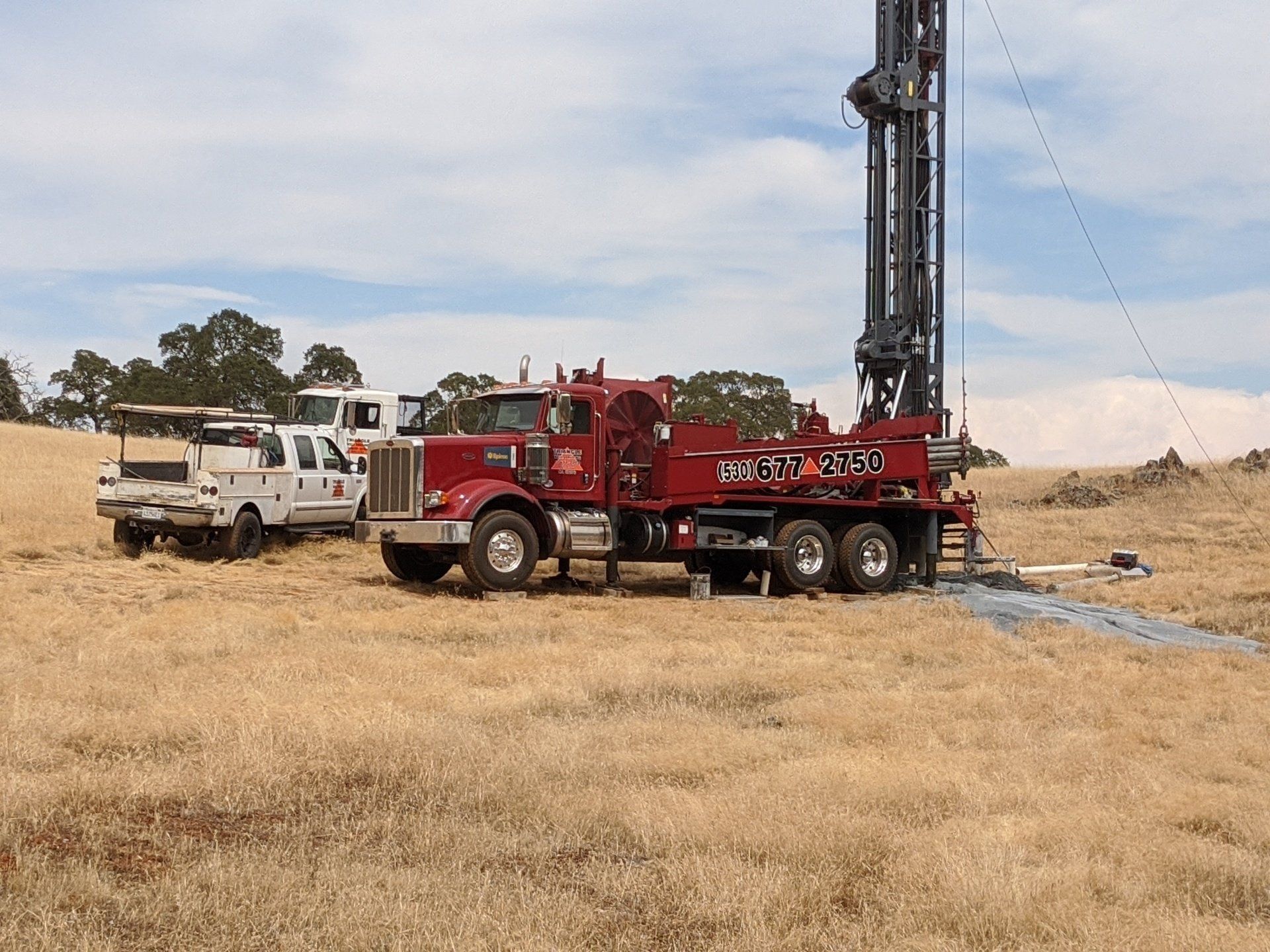 Red Drilling Rig — Rescue, CA — Triangle Well Drilling