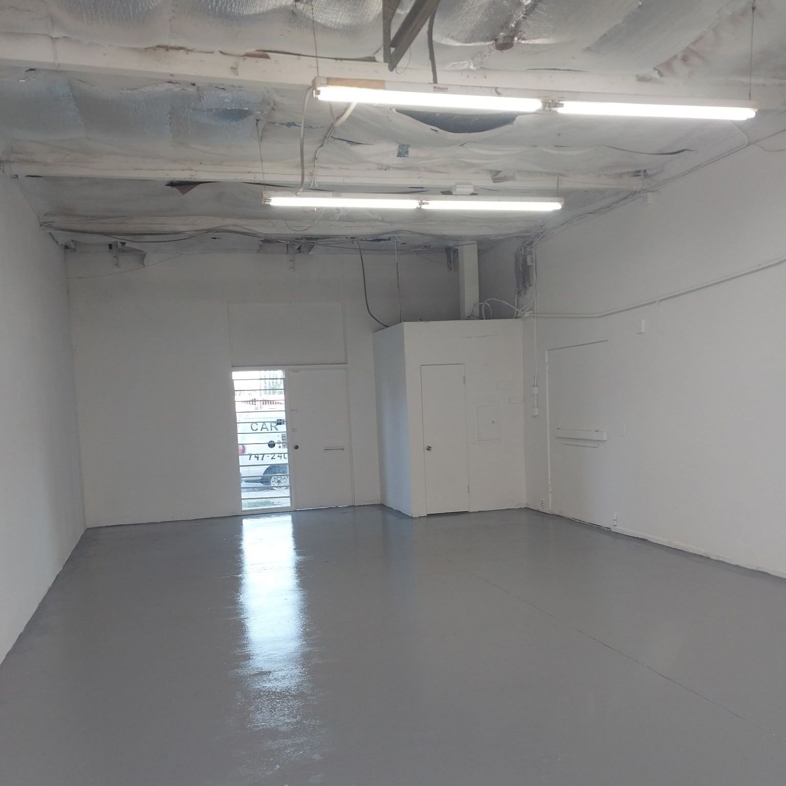 Interior photo of a seating area overlooking the city