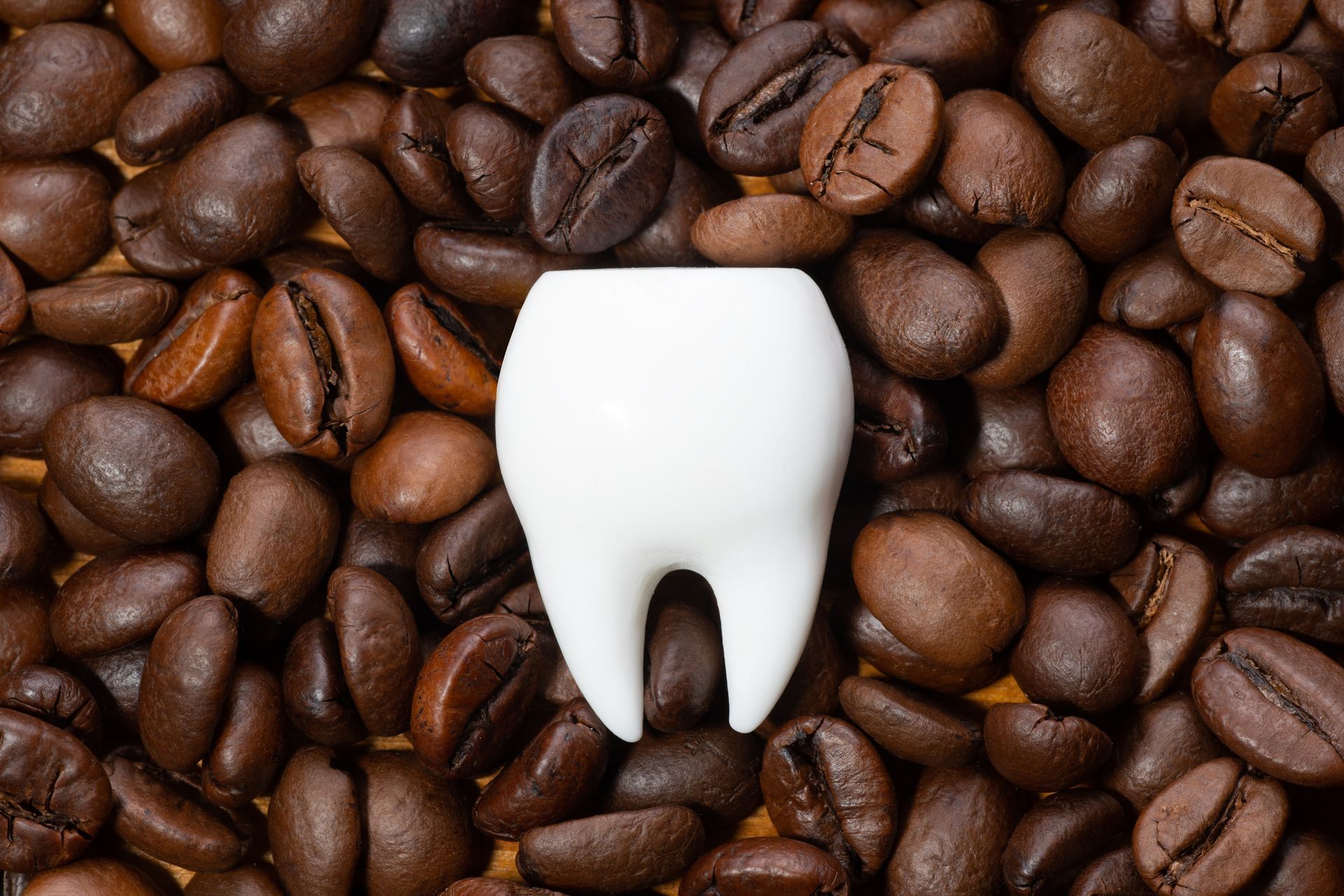 Coffee with a teeth in the middle