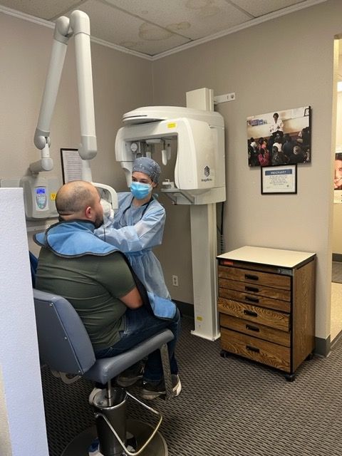 man getting dental exam