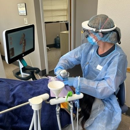 doctor working on patient
