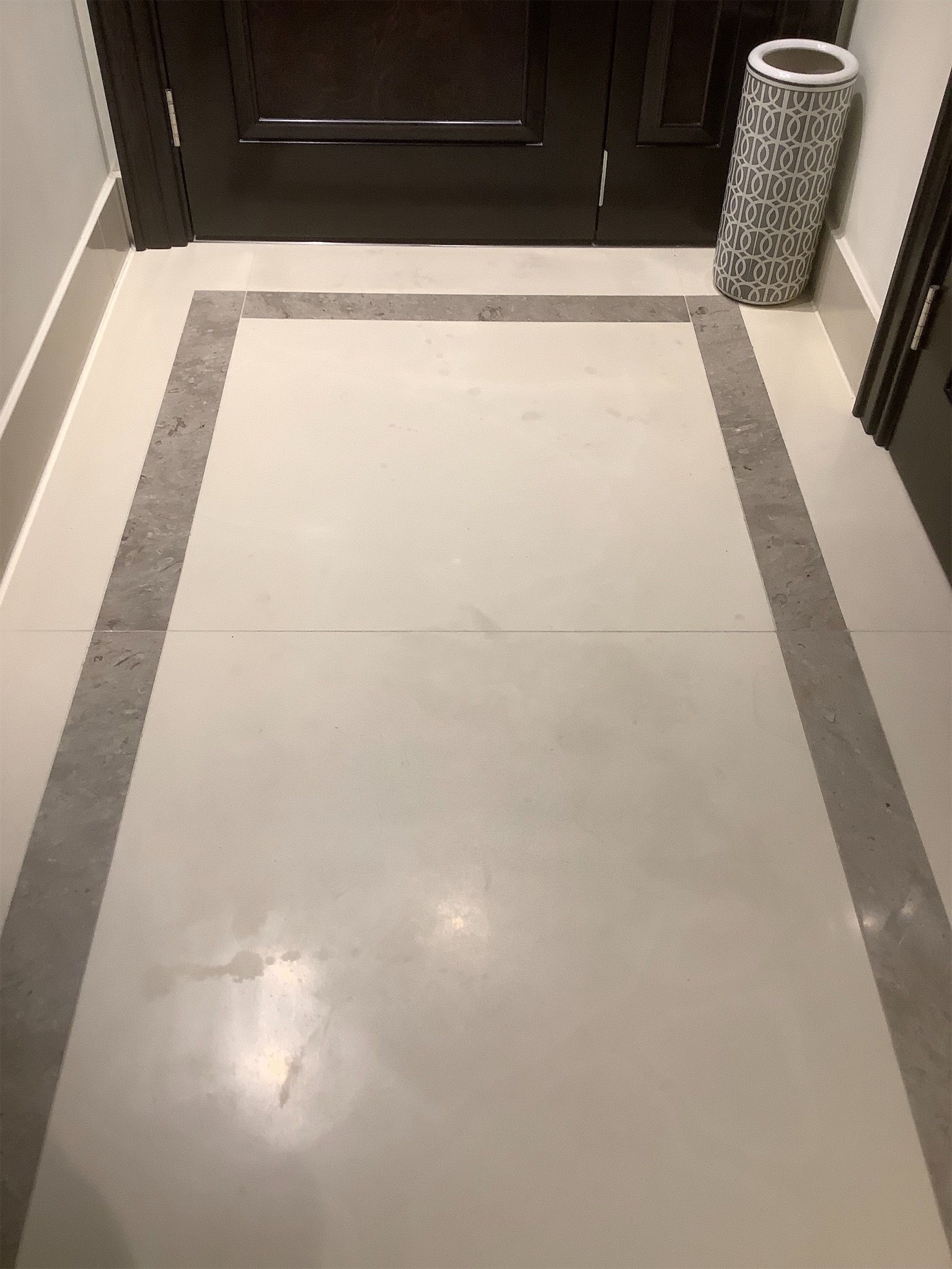 Hallway flooring condition photographed during inventory inspection