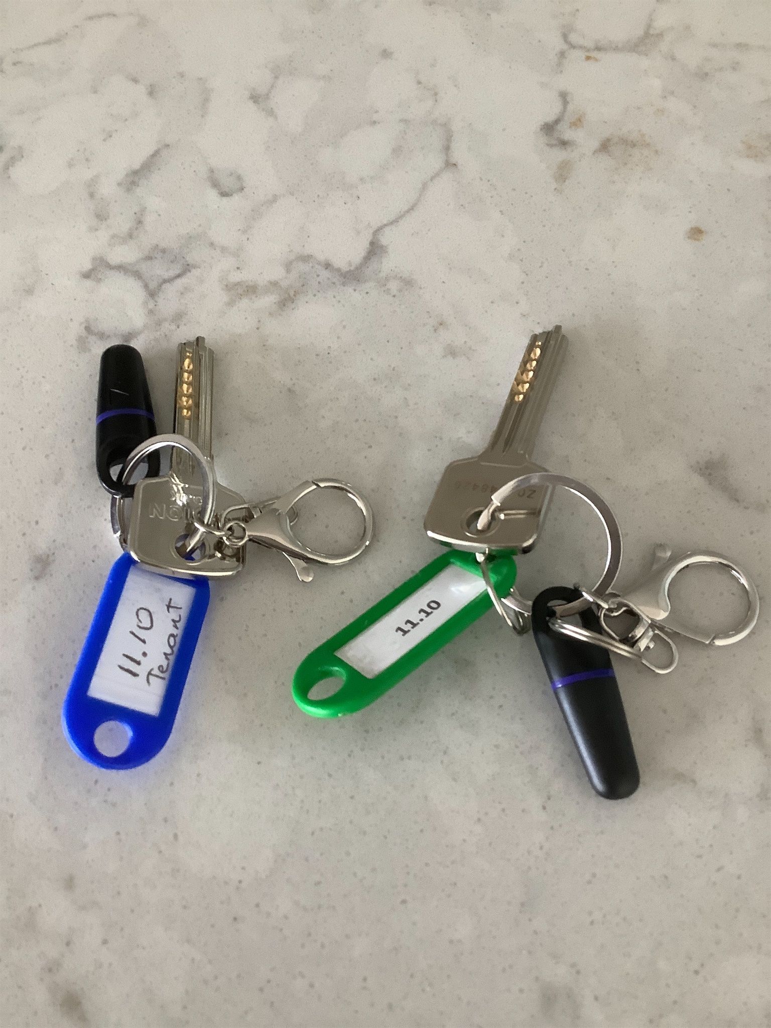 Property keys and access fobs photographed for inventory documentation