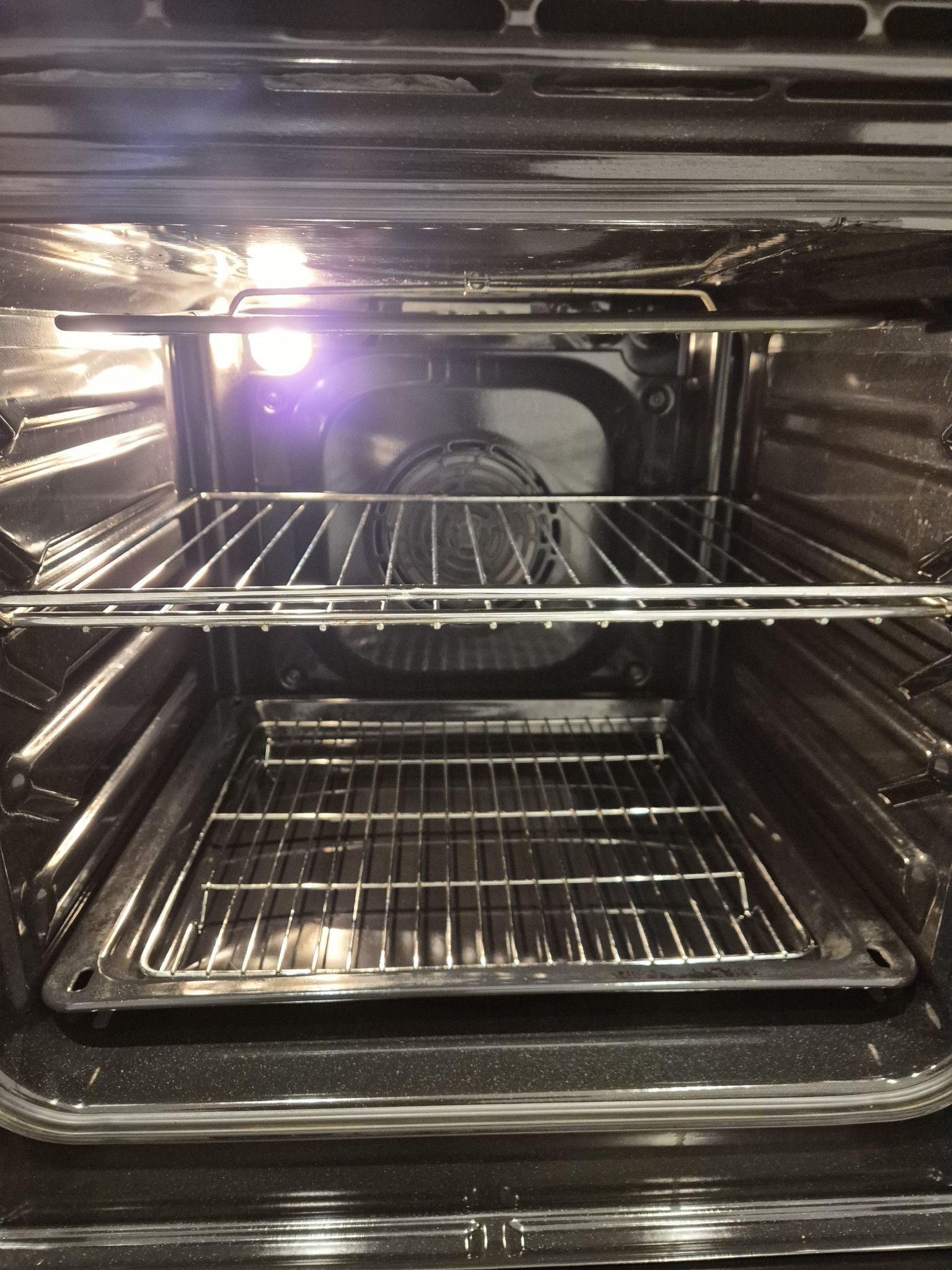 Oven interior photographed to document condition – inventory report