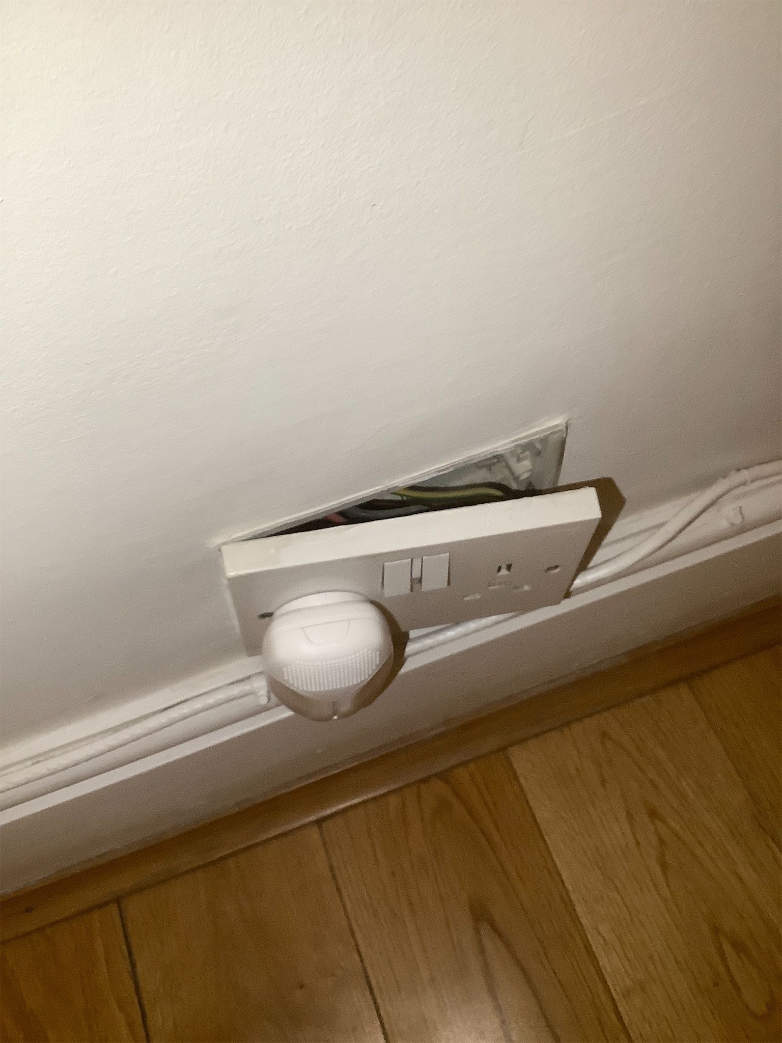 Loose electrical socket pulling away from wall – maintenance issue