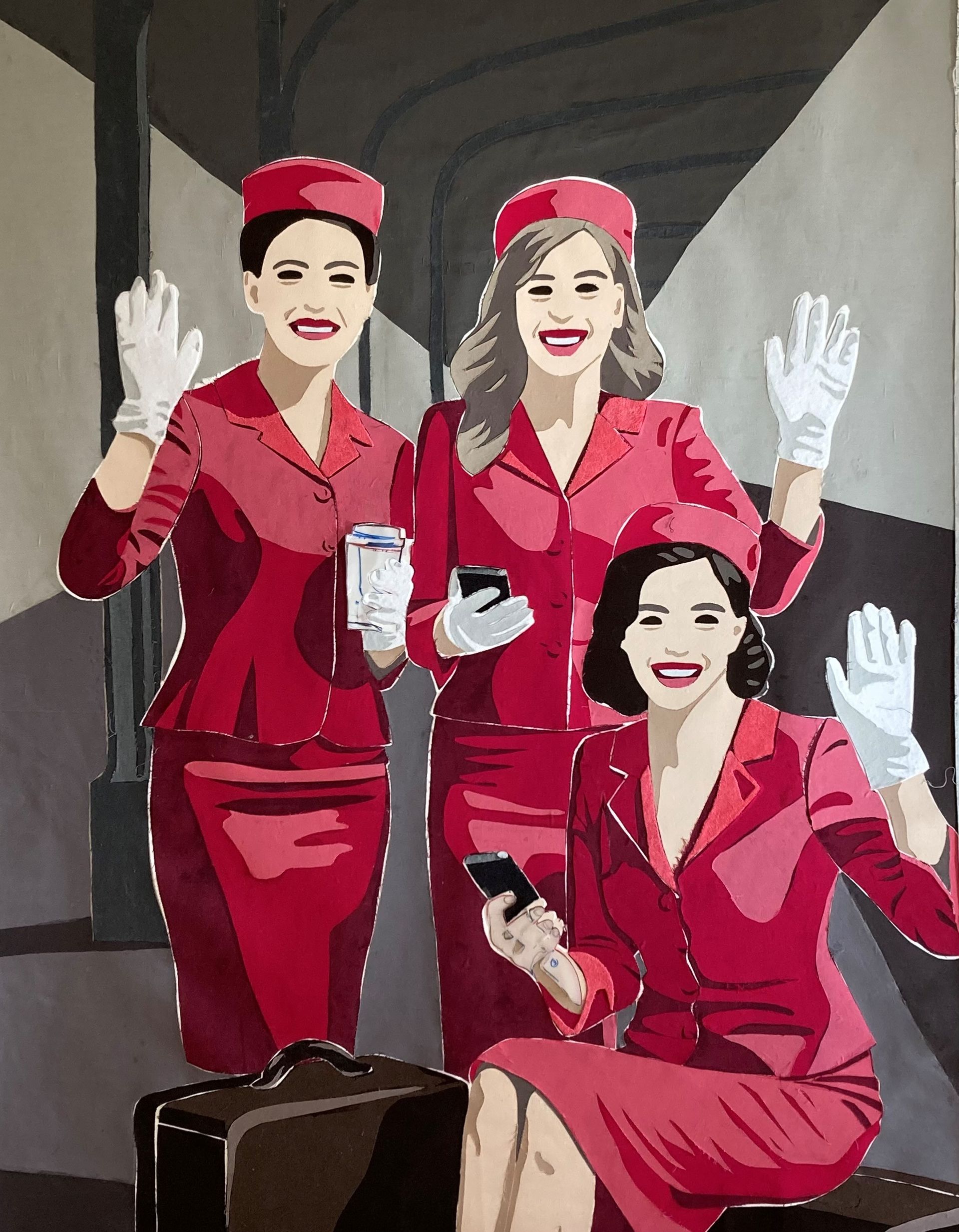 Drei Frauen in roten Uniformen winken in einem Bahnhof und halten Handys in der Hand.