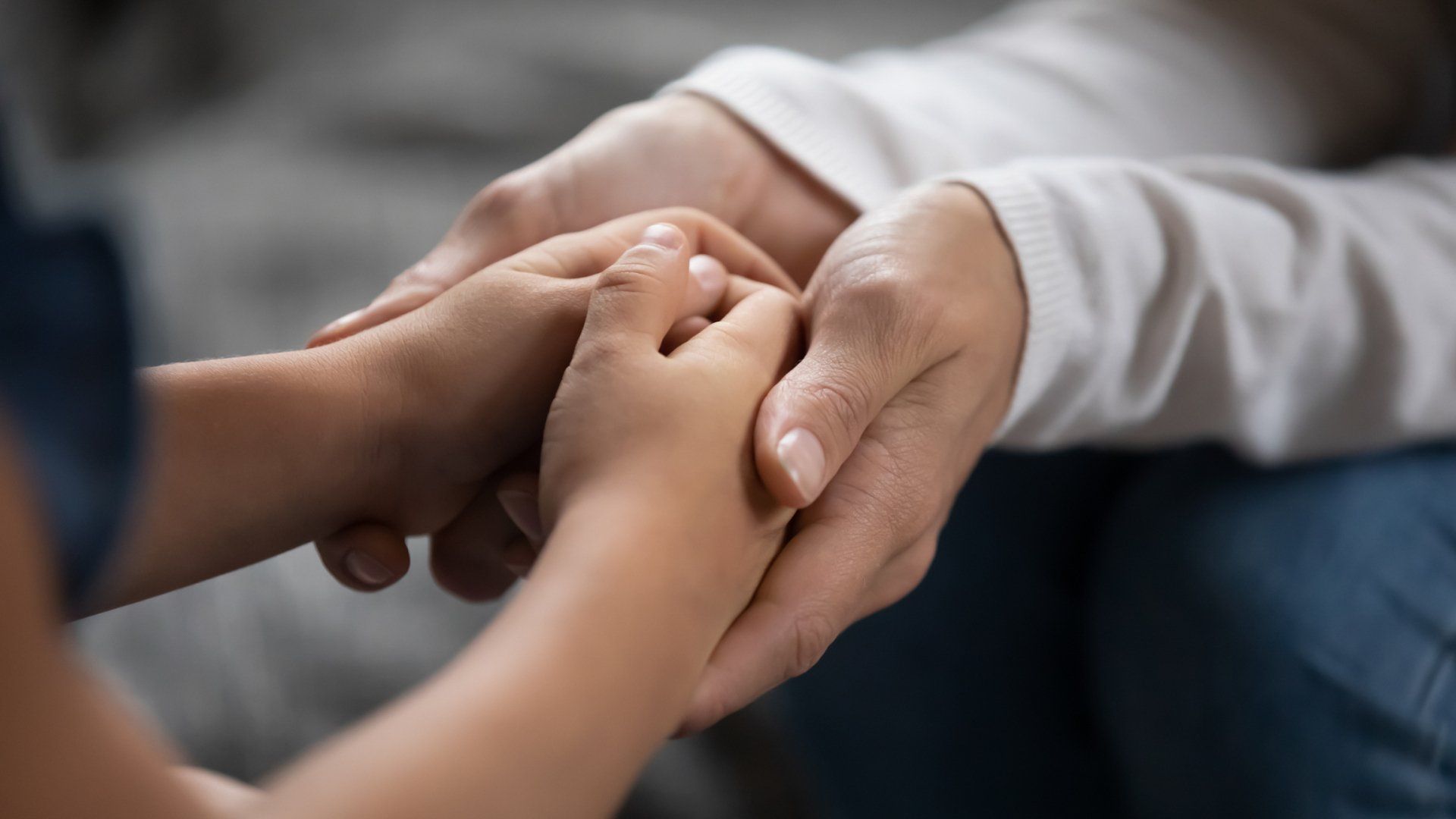 Mother Holding Daughter Hands — Redcliffe & Caboolture, NSW — Catton Roderick Lawyers