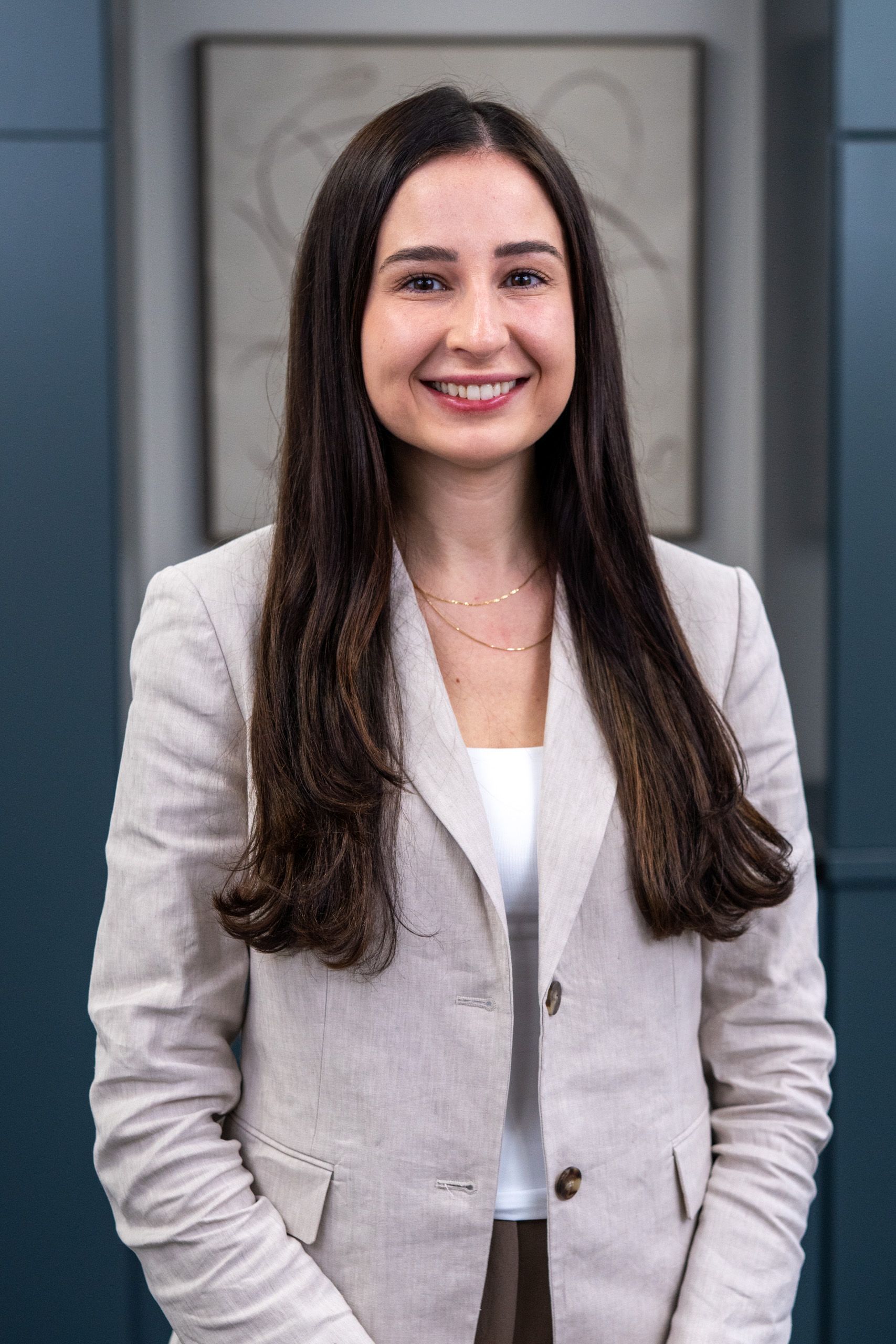 A man stands in front of a sign that says evolve brain