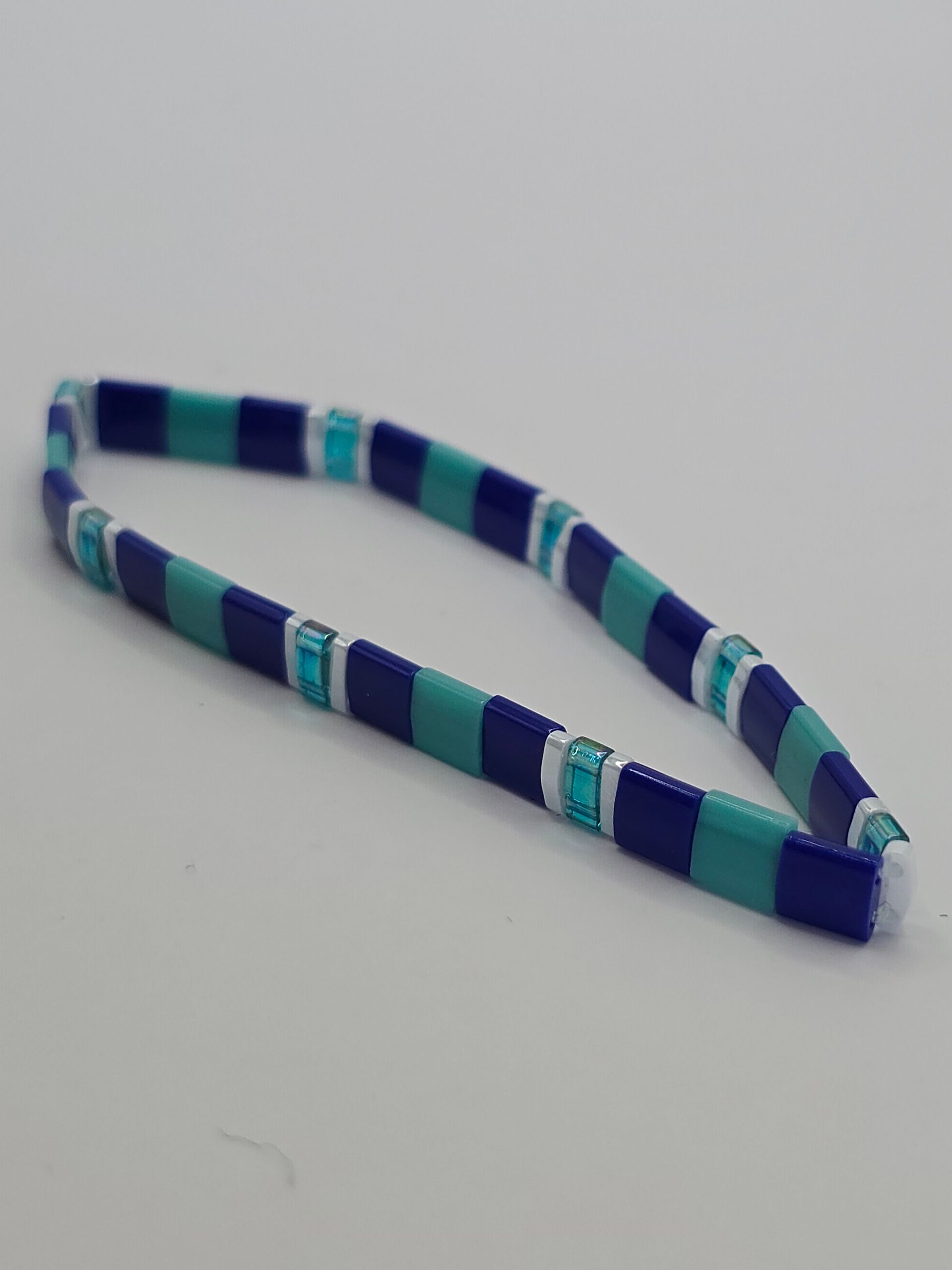 blauw met witte armband