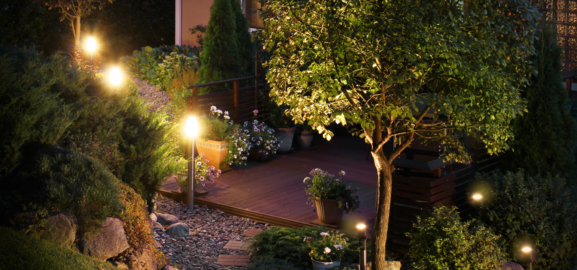 Beautiful landscaping lights in a garden patio that was landscaped by us