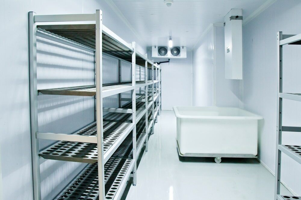 A Room With A Lot Of Shelves And A Table In It — Jordan Wheatland Air Conditioning & Refrigeration In Forbes, NSW