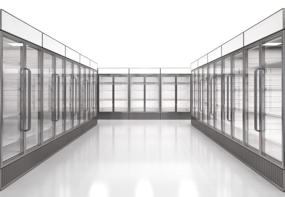 A Row Of Refrigerators With Glass Doors In A Store — Jordan Wheatland Air Conditioning & Refrigeration In Trangie, NSW