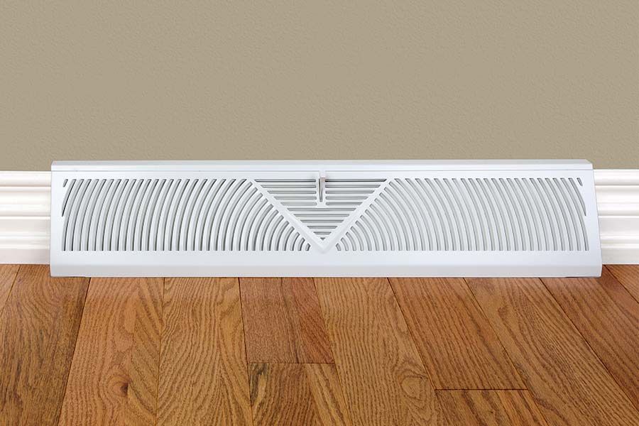 A White Air Vent On A Wooden Floor — Jordan Wheatland Air Conditioning & Refrigeration In Dubbo, NSW