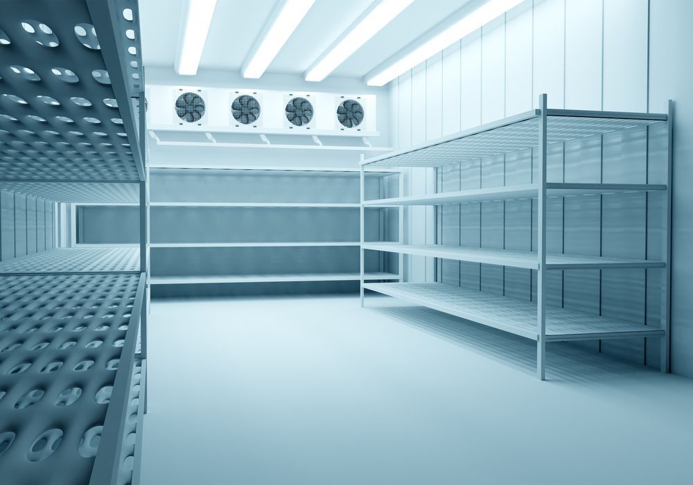 Empty Refrigerated Storage Room With Metal Shelving — Jordan Wheatland Air Conditioning & Refrigeration In Dubbo, NSW