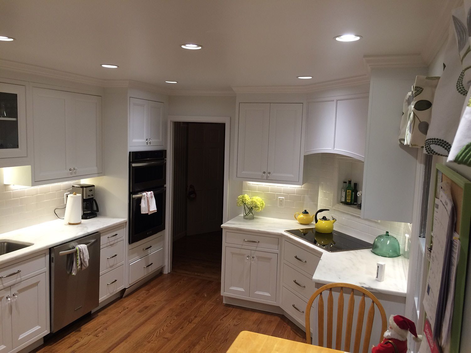 White Kitchen with Hardwood Flooring