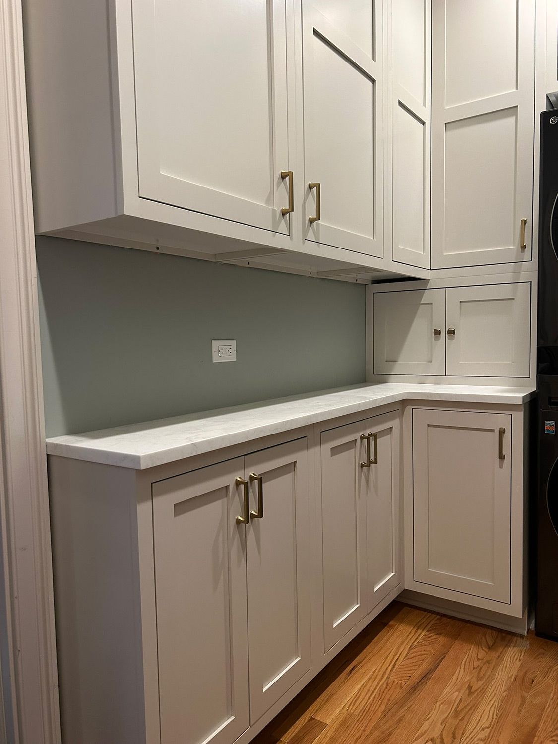 White Cabinets in a Laundry Room