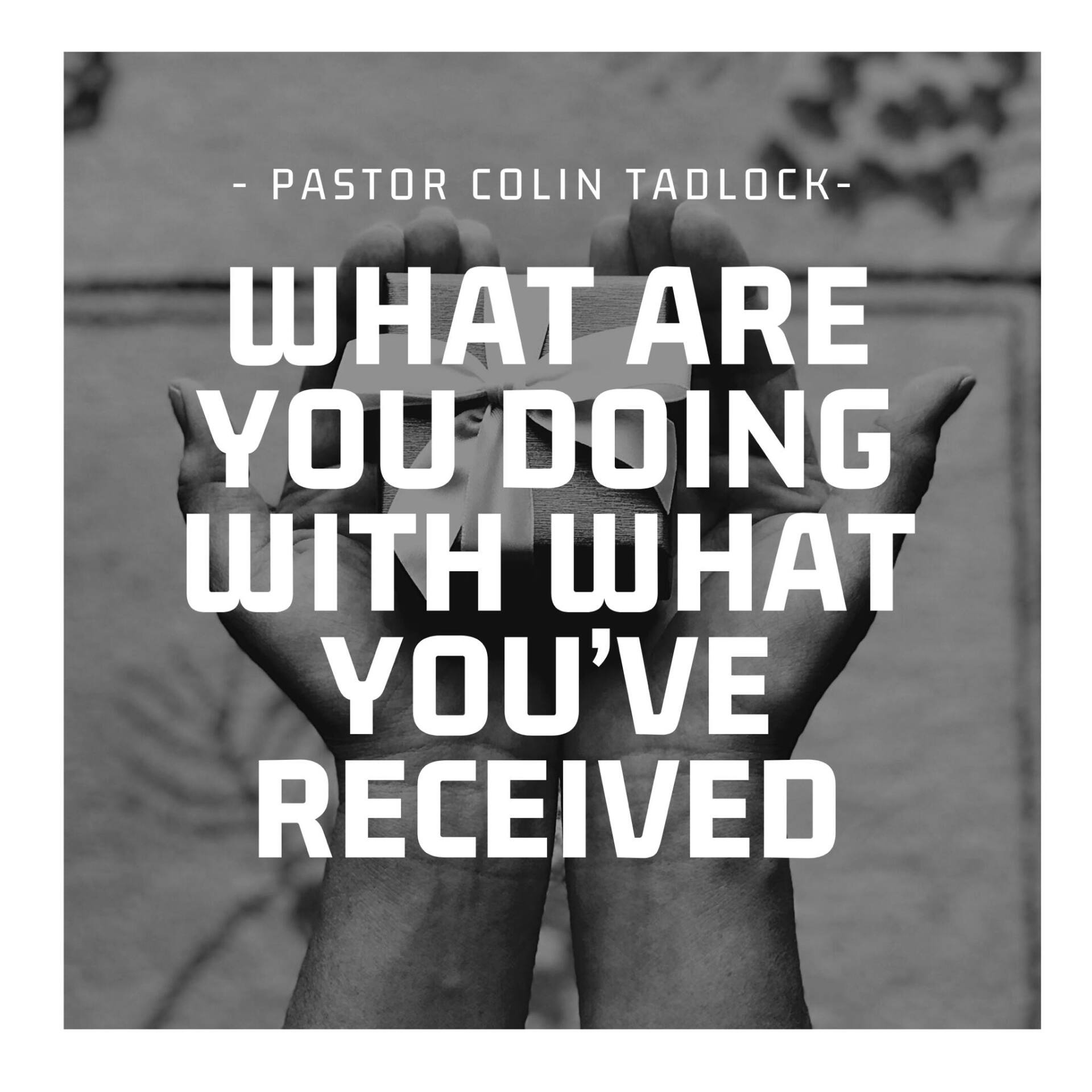 Hands cupped, holding paper. Text: