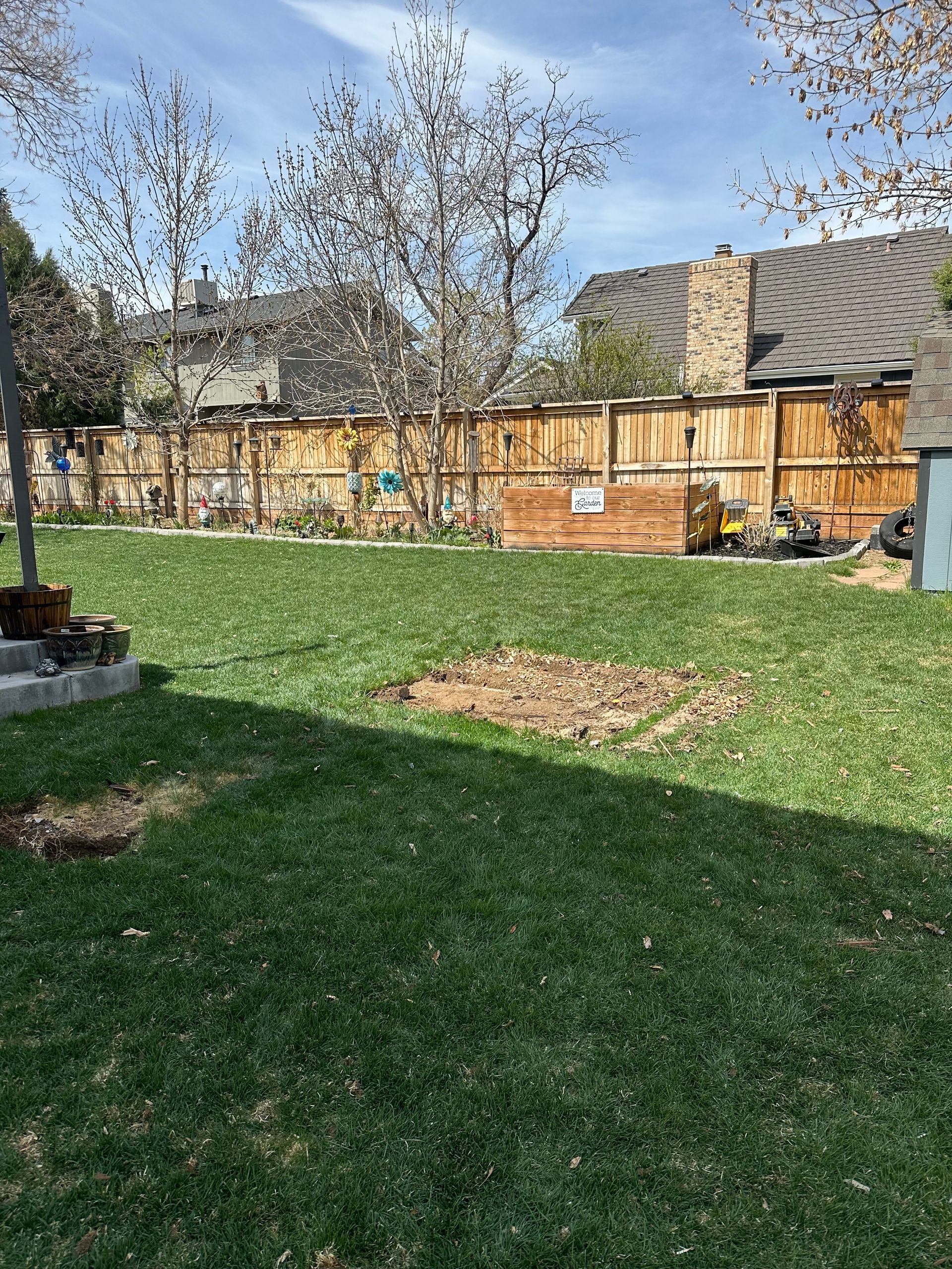 Gray wooden playset is no longer visable. An after picture taken in Louisville, CO.