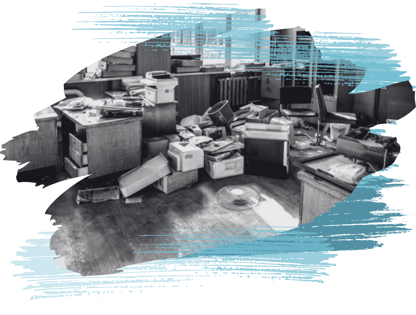 Messy office with papers, boxes, and furniture scattered on the floor, suggesting a disorganized workspace.