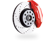 Red brake caliper on a drilled and slotted brake rotor.