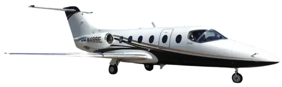 A white and black airplane with its wheels down.