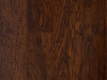 A close up of a brown wooden floor.