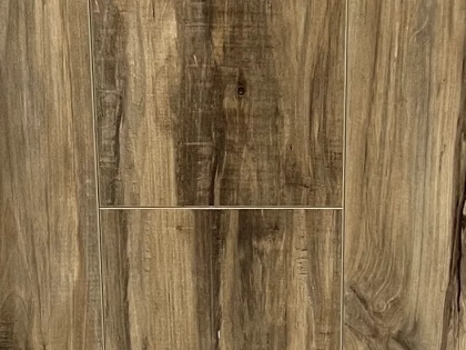 A close up of a wooden floor with a grain and texture.
