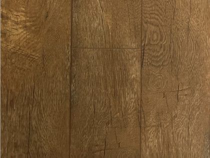 A close up of a wooden floor with a grainy texture.