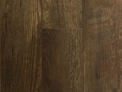 A close up of a brown wooden floor.