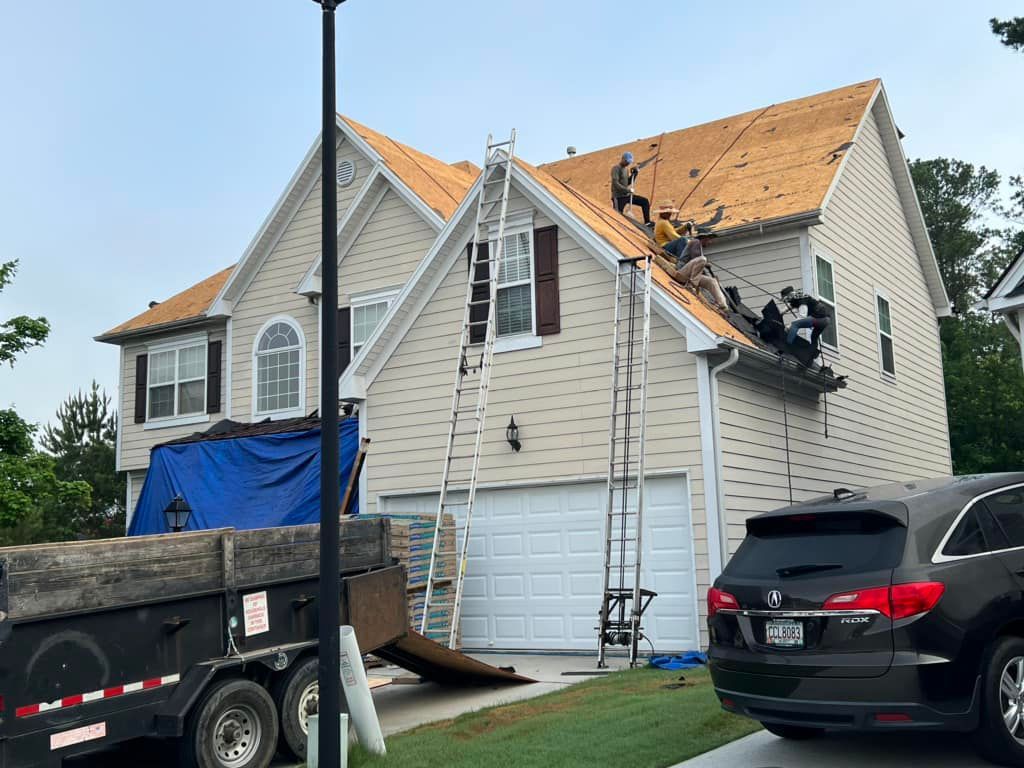 A car is parked in front of a house that is being remodeled.