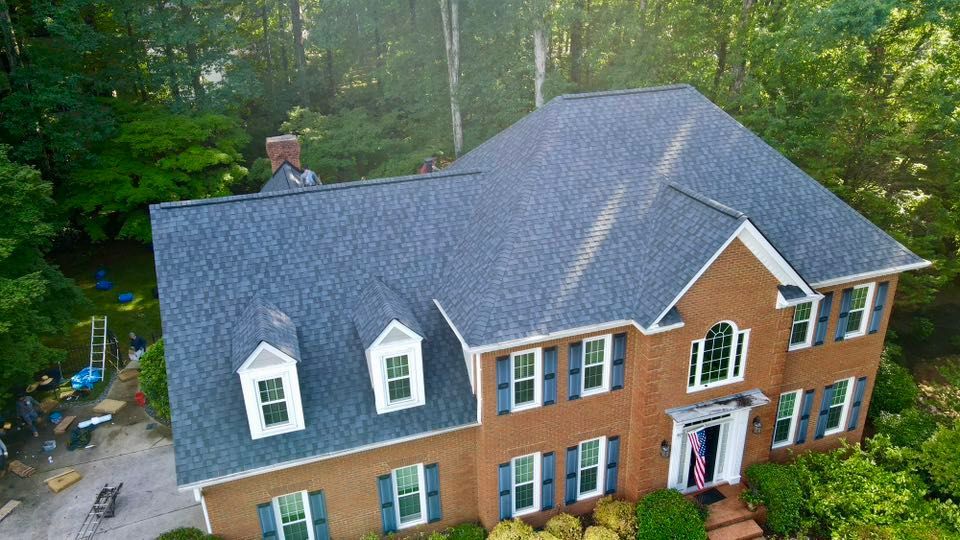 Brick house with a new roof.