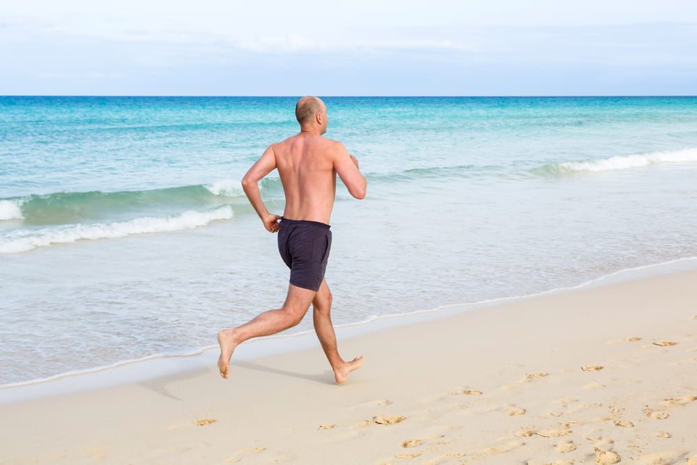 Jogging At The Beach - Chiropractic Services in Mackay, QLD