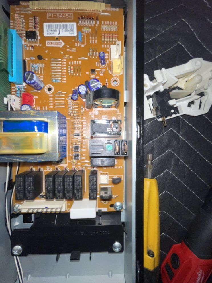 John B Laundry part removed in repairing an appliances servicing in Massachusetts Regions