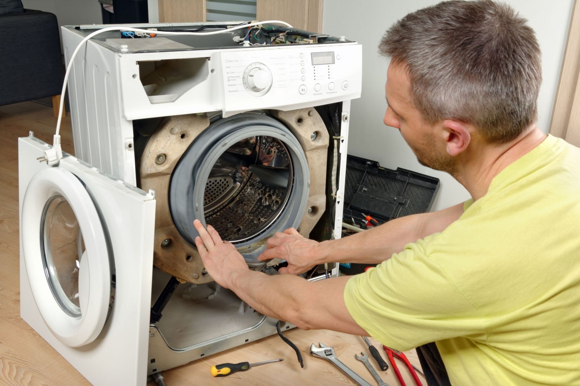 John B Laundry repairs a washer servicing in  Massachusetts Regions