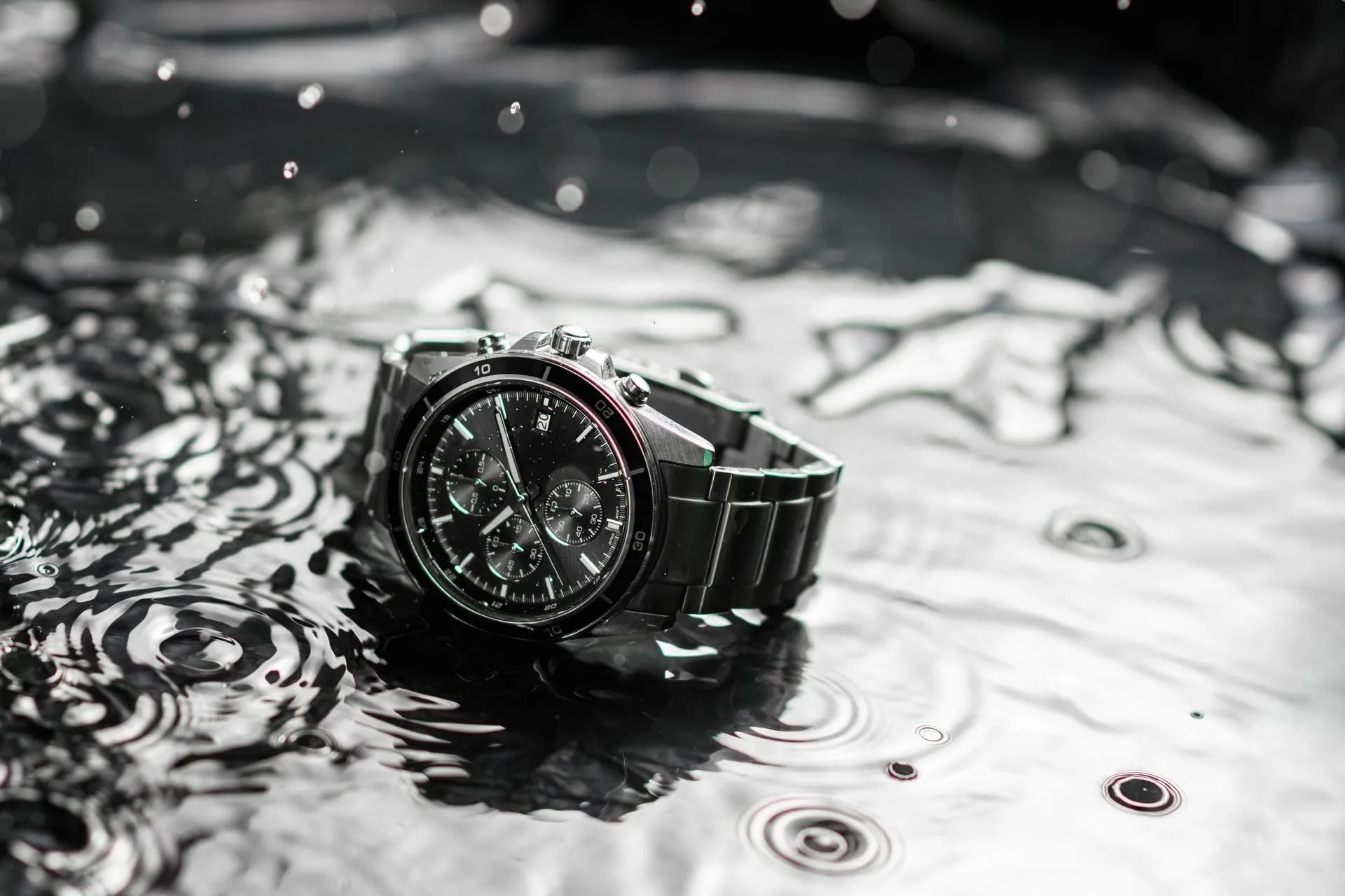 Watch on a Wet Surface With Raindrops — Coastal Clocks & Watches in Mooloolaba, QLD