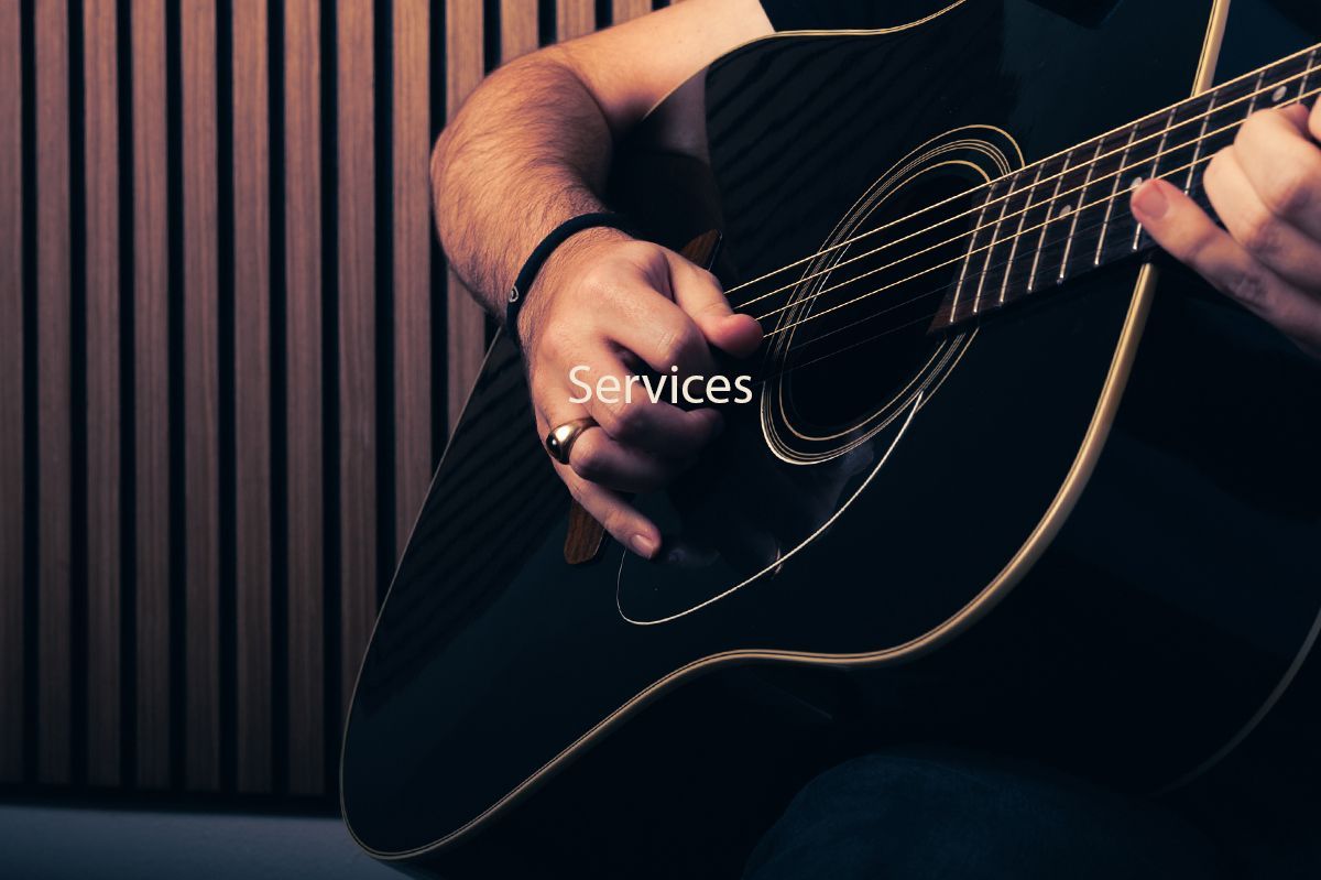 Jake Ackerman playing guitar