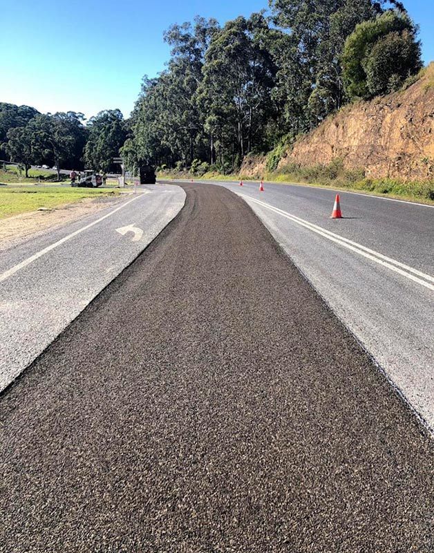 A Road With a Lot of Trees on the Side of It — North Coast Asphalts in Corindi Beach, NSW