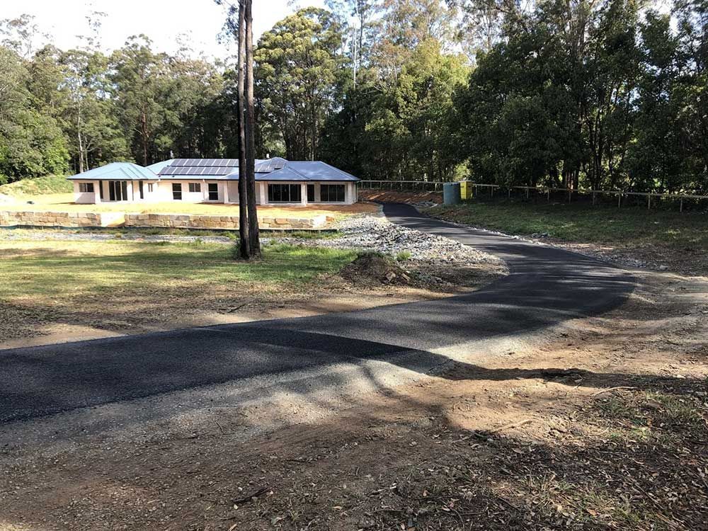 Paved Driveway Leads to a One-story House — North Coast Asphalts in Corindi Beach, NSW