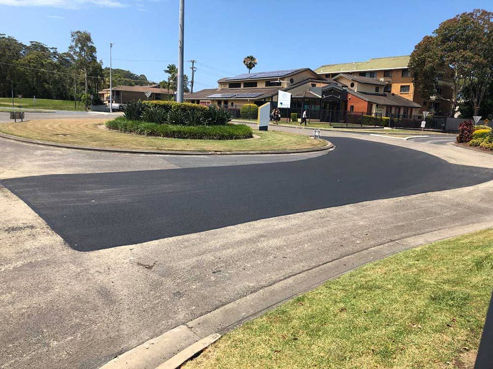 A Road That Has Been Paved in a Residential Area — North Coast Asphalts in Corindi Beach, NSW