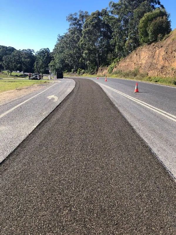A Road With a Lot of Trees on the Side of It — North Coast Asphalts in Corindi Beach, NSW