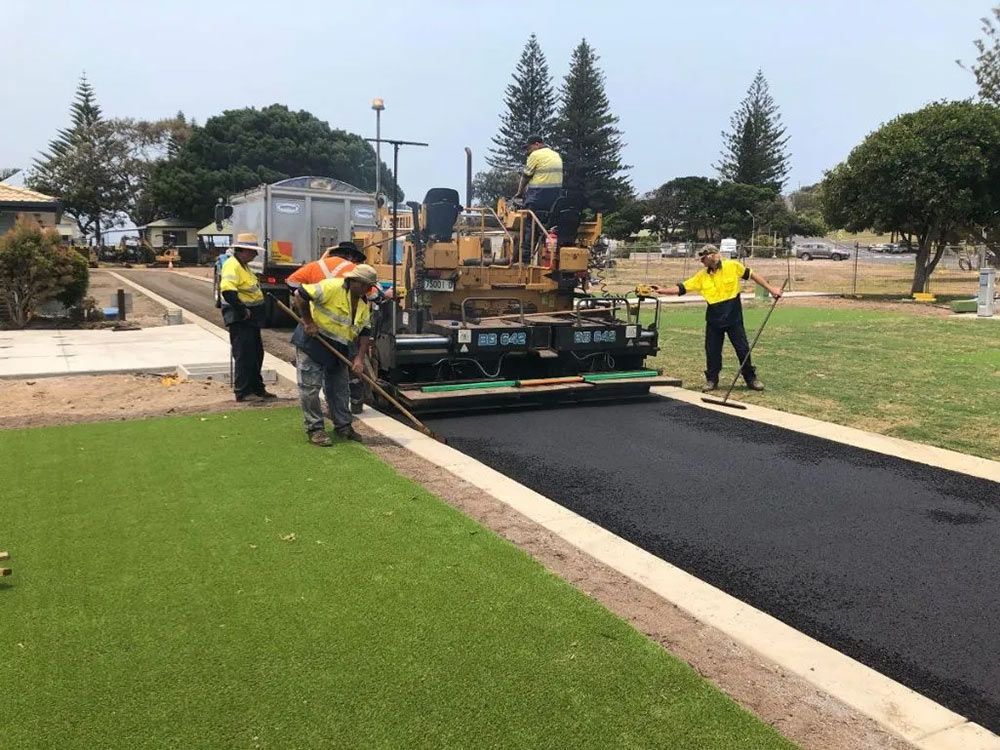 A Group of People Are Working on a Road in a Park — North Coast Asphalts in Corindi Beach, NSW