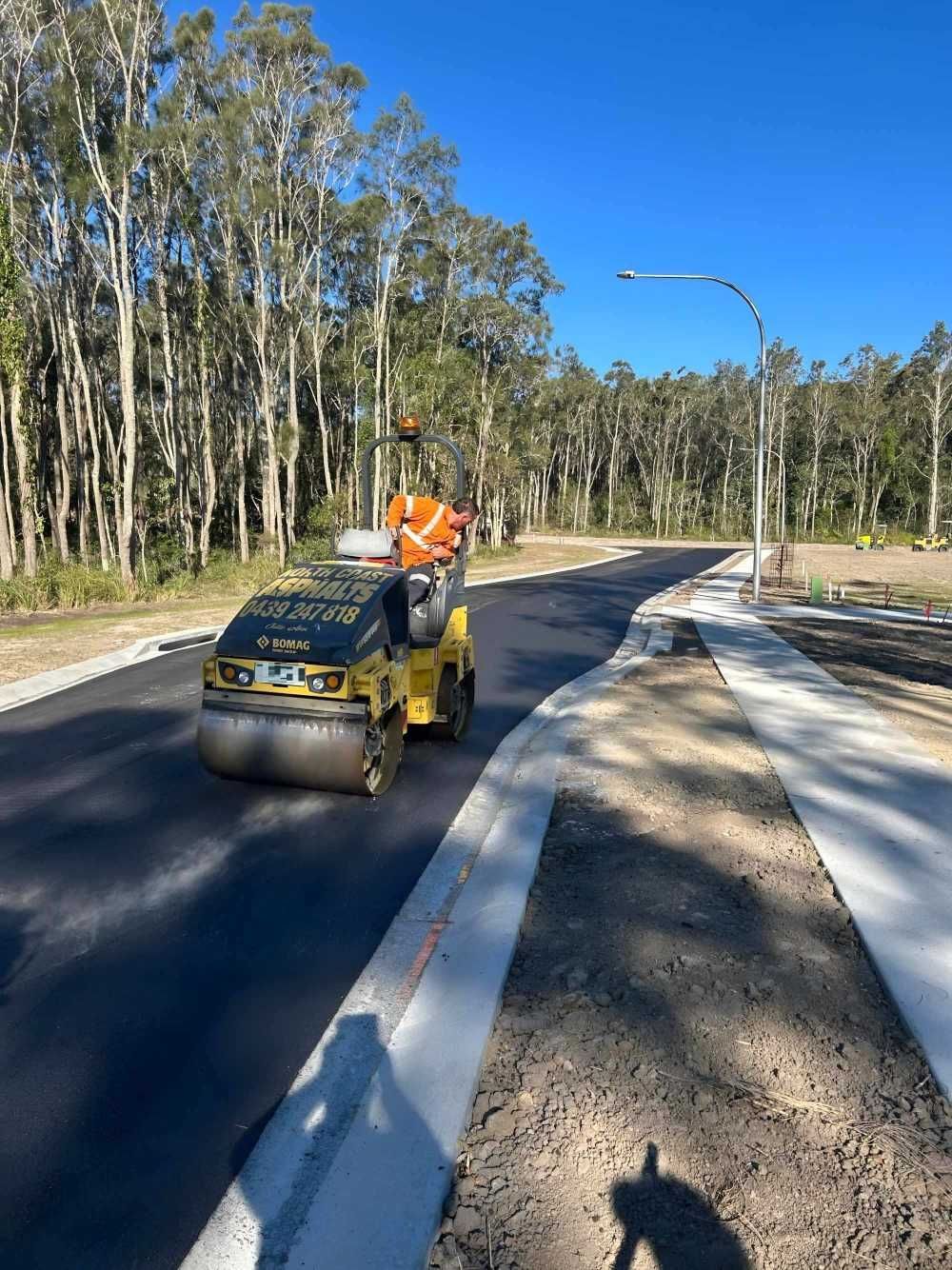 Road Roller Compacting Fresh Asphalt — North Coast Asphalts in Corindi Beach, NSW