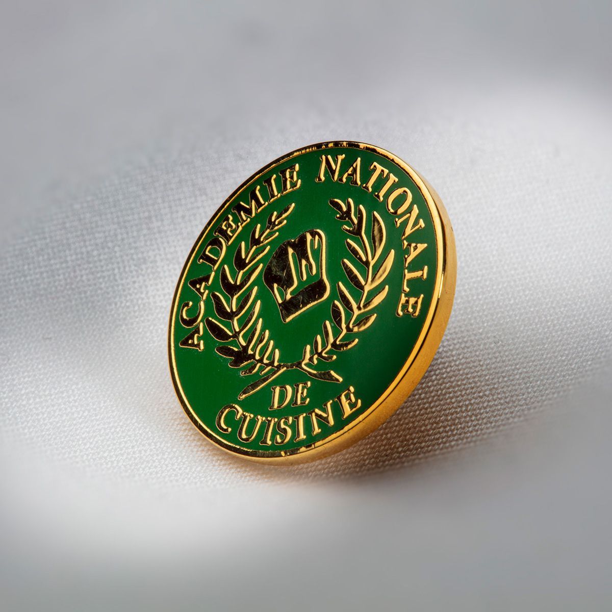 Pins de l'Académie Nationale de Cuisine