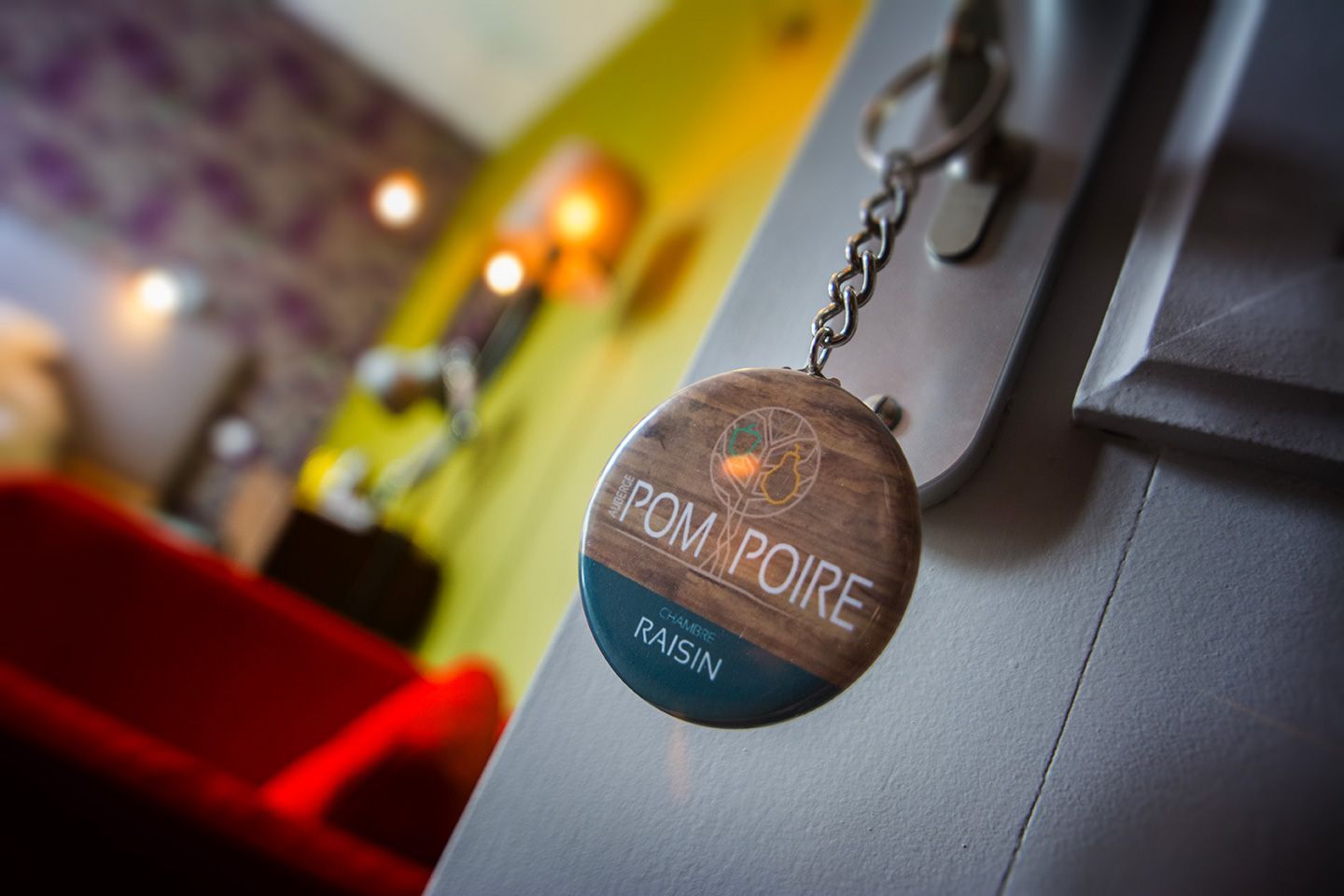 Porte-clef des chambres de l'auberge Pom Poire.