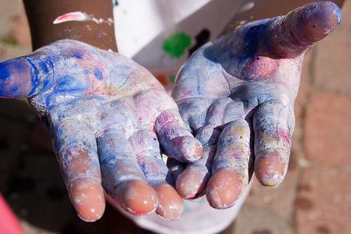 kids hands with paint
