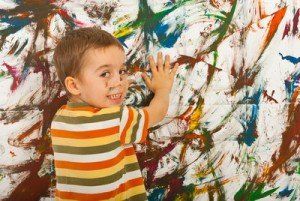 child playing paints