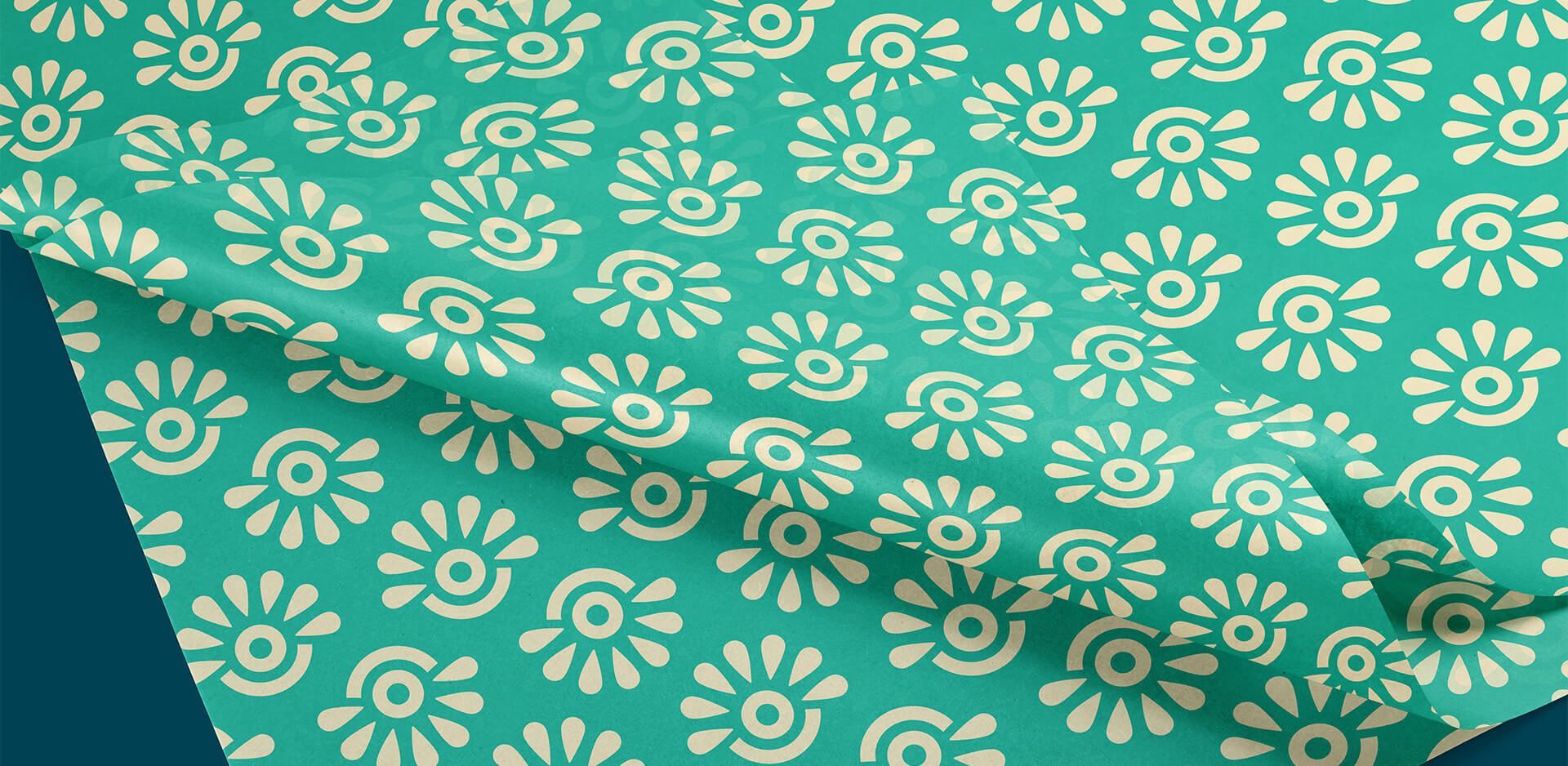 Custom brand pattern shown on tissue paper for PNW small business.