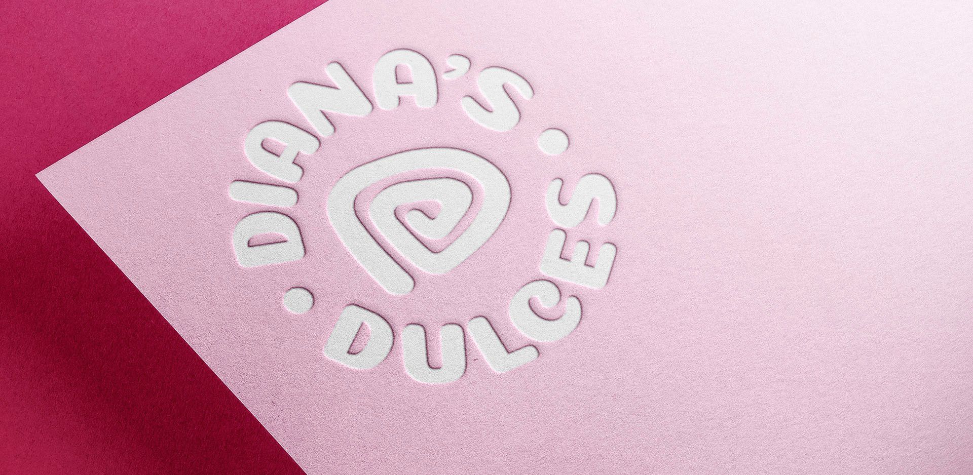 secondary logo embossed in white on pink, textured paper for food vendor rebrand