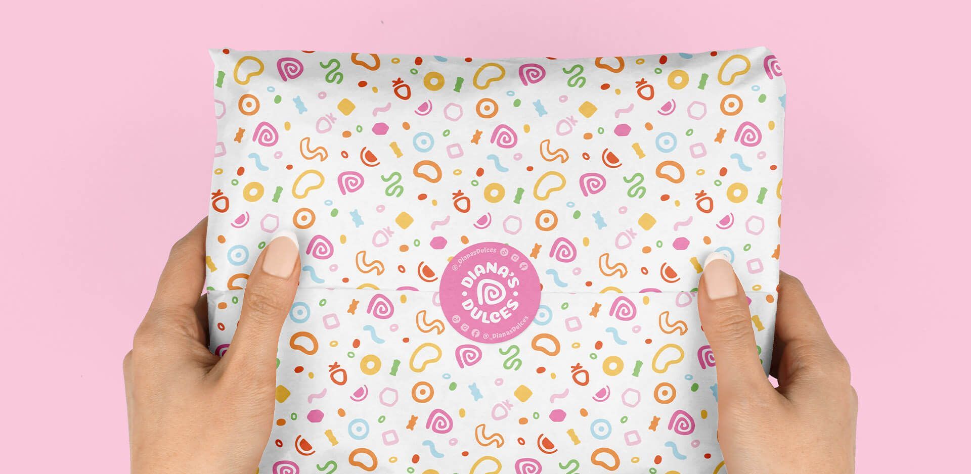 Custom pattern design on wrapping paper with a designed sticker for woman-owned business.